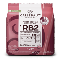 Callebaut Шоколад Ruby молочний 32,8% 400г. Це новий та вдосконалений варіант оригінального рубінового шоколаду, який характеризується ще більш насиченим фруктовим смаком із вираженою терпкою кислинко