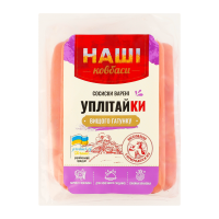 Наші Ковбаси Сосиски Уплітайки варені вищий ґатунок кг. Склад: м`ясна сировина 97% (філе куряче знежиловане, яловичина знежилована вищого гатунку, яловичина знежилована першого гатунку, сало бокове),