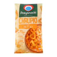 Снеки кукурудзяні Przysnacki зі смаком сиру 130г. Склад: кукурудзяна крупа, рапсова олія (17%), порошок перміану з сироватки (з молока), сіль, натуральний ароматизатор сир, сирний порошок (0.7%) (з мо