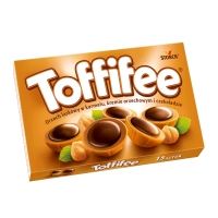 Цукерки Storck Toffifee з лісовими горіхами в карамельній чашечці з кремовою нугою і шоколадом 125г. Склад: цукор, рослинні жири (пальмовий, дерева ши), лісові горіхи цільні, сироп глюкози, суха молоч