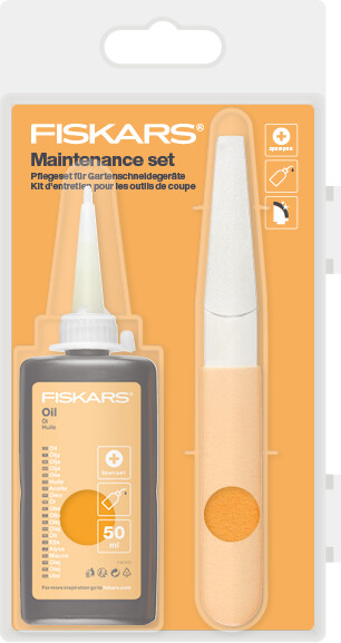 Комплект ухода за инвентарем Fiskars, алмазный напильник и смазочное масло.