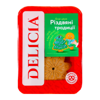 Печиво Delicia Різдвяні традиції цукрове 0.25кг. Склад: борошно пшеничне, пудра цукрова, глазур цукрова для декору (зеленого, синього кольору) (пудра цукрова, крохмаль кукурудзяний, патока, емульгатор