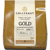 Шоколад Callebaut Gold білий 30.4% 400г. Склад: какао масло, цукор, сухе молоко, молочний цукор, порошок молочної сироватки, сухе знежирене молоко, карамелізований цукор, емульгатор: соєвий лецитин, н