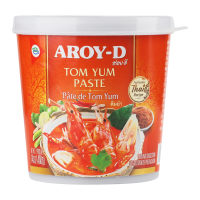 Паста Aroy-D Tom Yum 400г. Склад: лемонграсс 24%, рафінована соєва олія, цибуля шалот, цукор білий, паста тамарінда, перець чилі червоний сушений, галангал, часник, сіль кухонна, регулятор кислотності