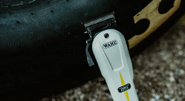 Машинка для стрижки WAHL Super Taper Cordless, акум., роторный мотор, насадок-4, расческа в компл., сталь, белый